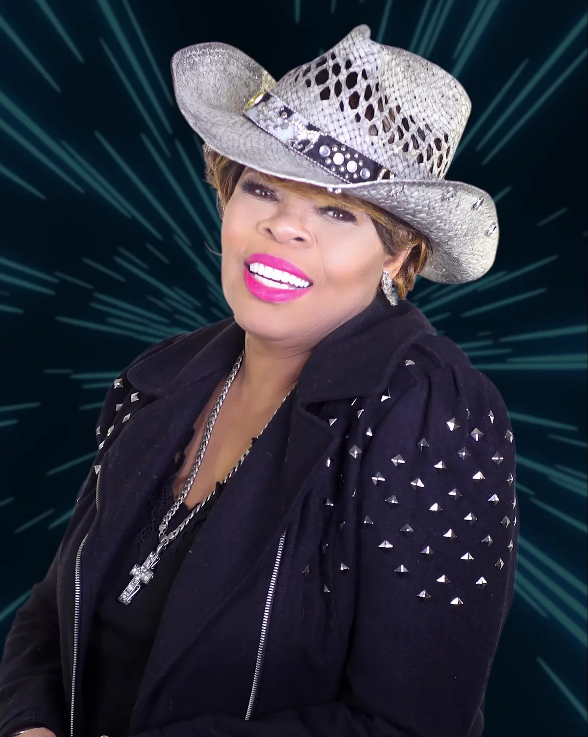 Apostle Mary Banks in a white rhinestone hat